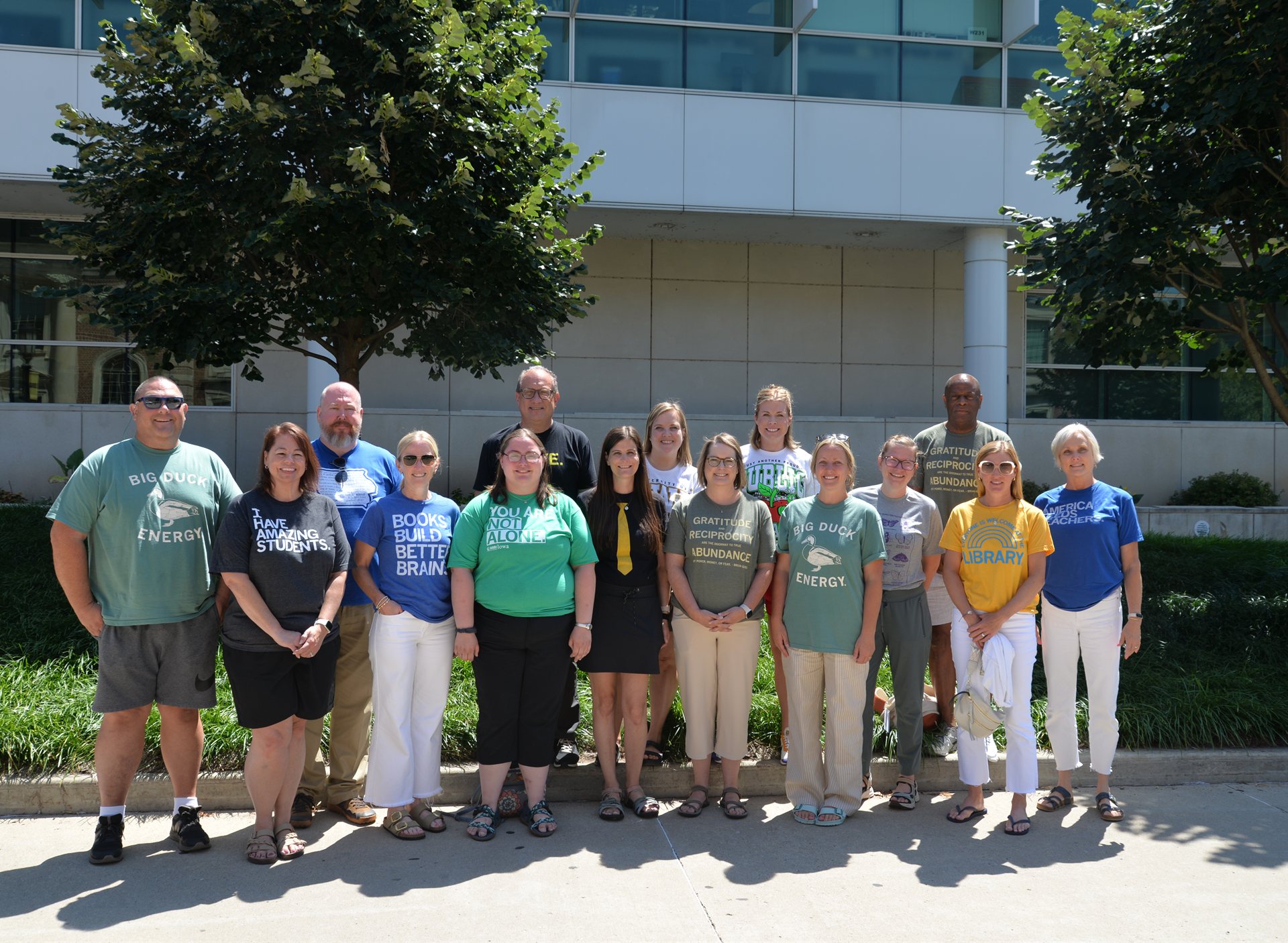 Belin-Blank Fellowship educators standing together outside on the University of Iowa campus