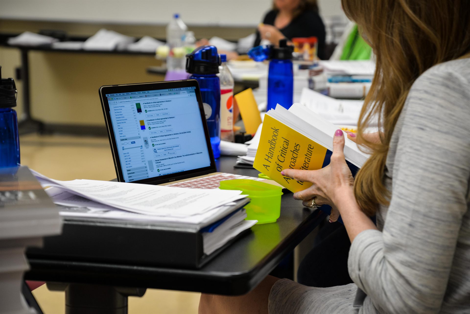 An educator attending an online Belin-Blank Center webinar